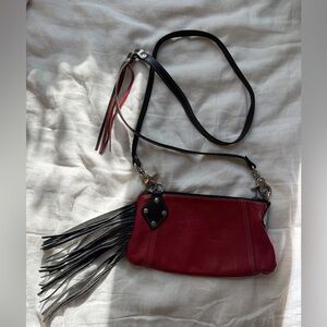 Elegant Red Leather Crossbody Bag with Fringe